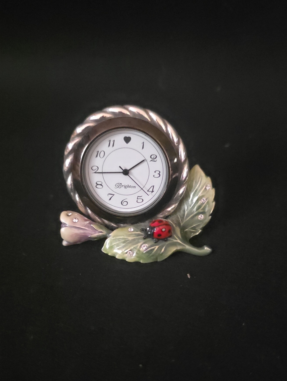 Brighton Silver-Tone Clock with Green Leaf and Red Ladybug Accent